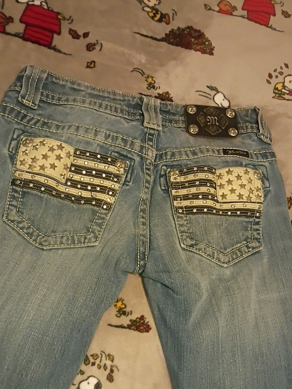Miss Me Light Blue Skinny Jeans with Flag-Embellished Back Pockets